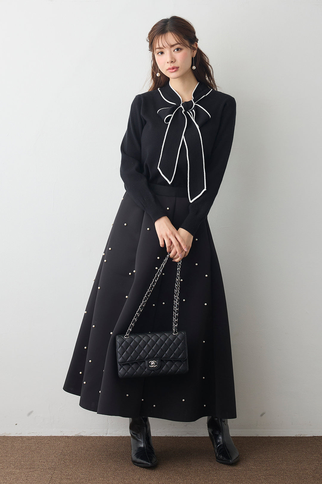 [予約/SET]配色ボウタイリボンニット+マルチパターンボンディングフレアスカート(2set)