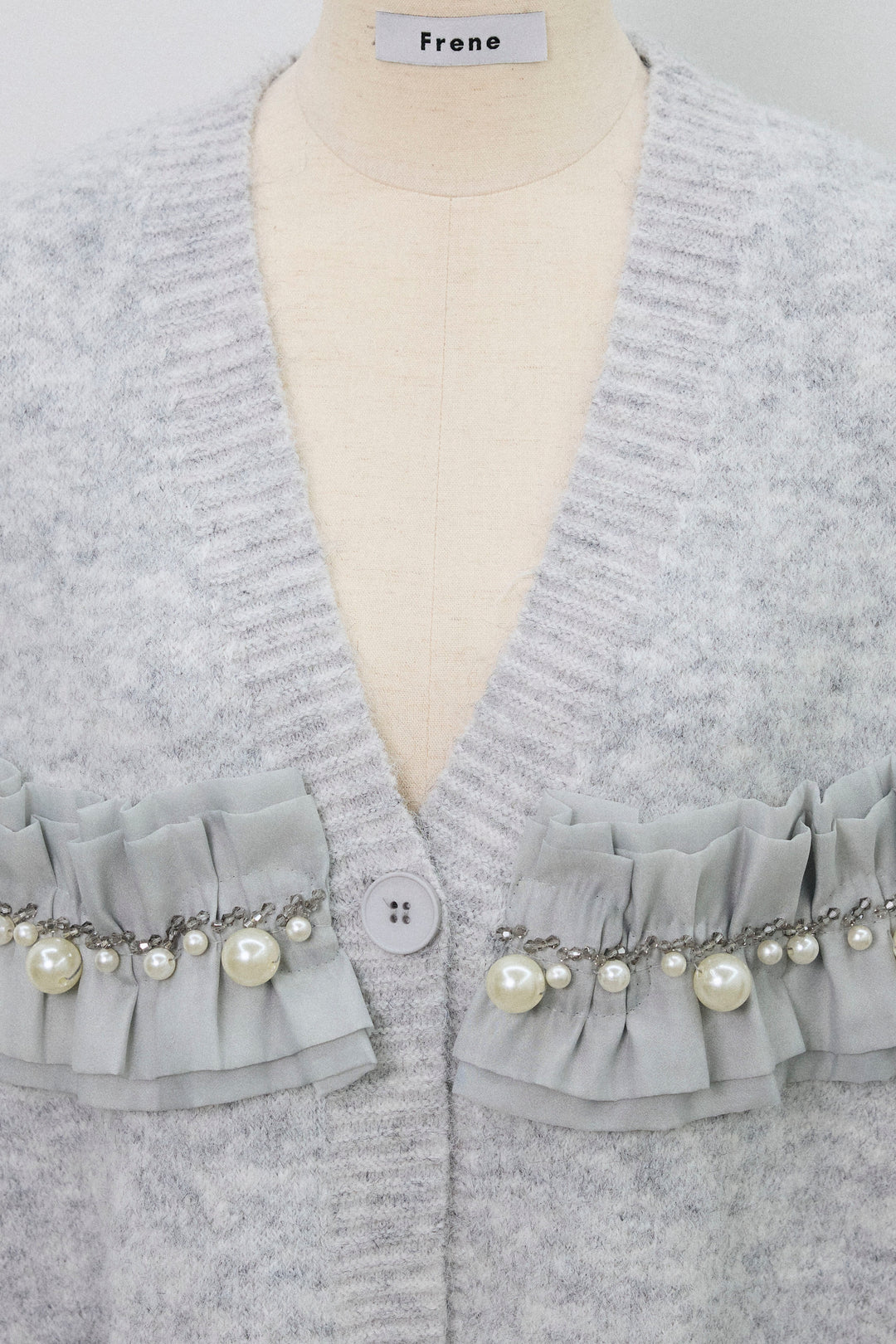 [予約]フリルパールドッキングニットコーディガン