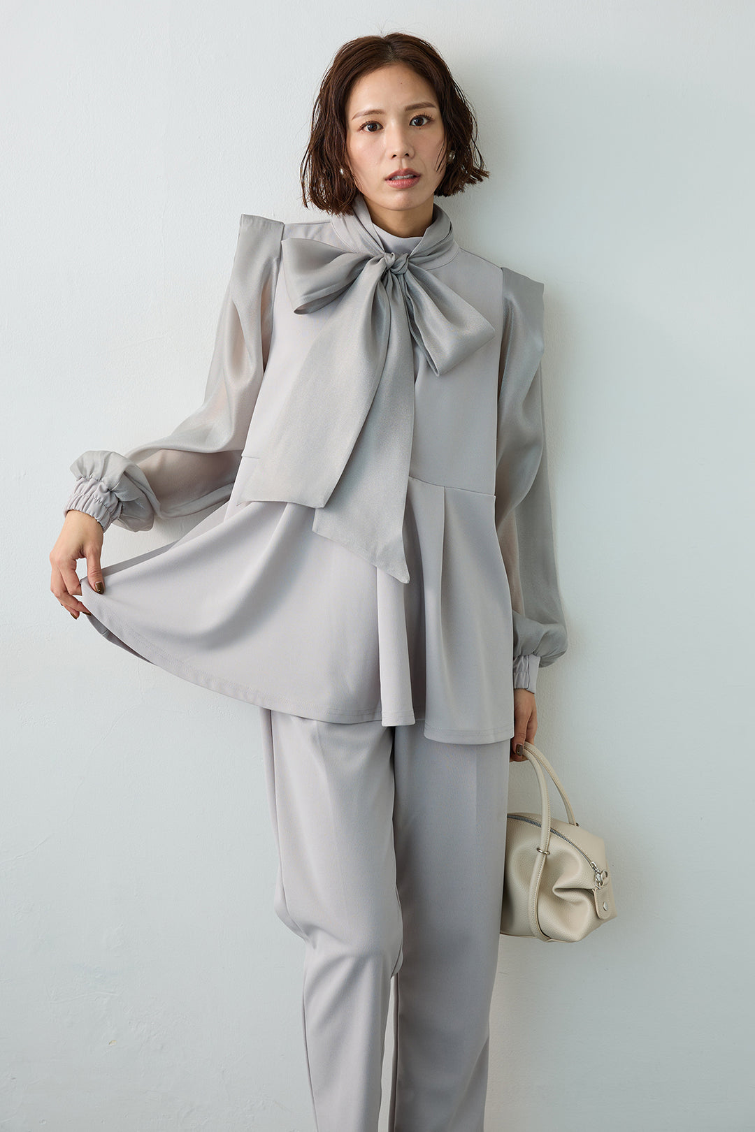 [予約]シアーリボン異素材ドッキングペプラムブラウス