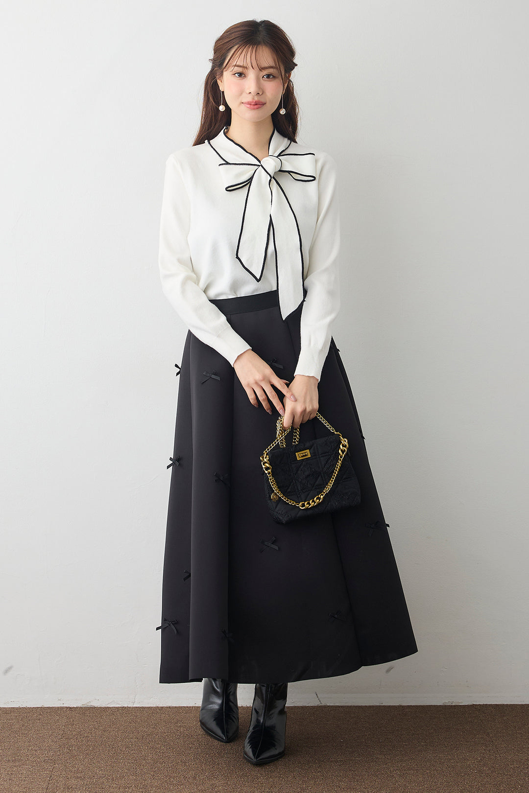 [予約/SET]配色ボウタイリボンニット+マルチパターンボンディングフレアスカート(2set)