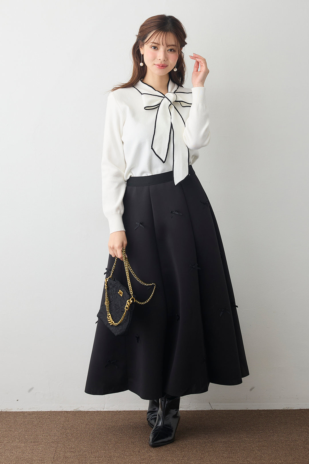 [予約/SET]配色ボウタイリボンニット+マルチパターンボンディングフレアスカート(2set)