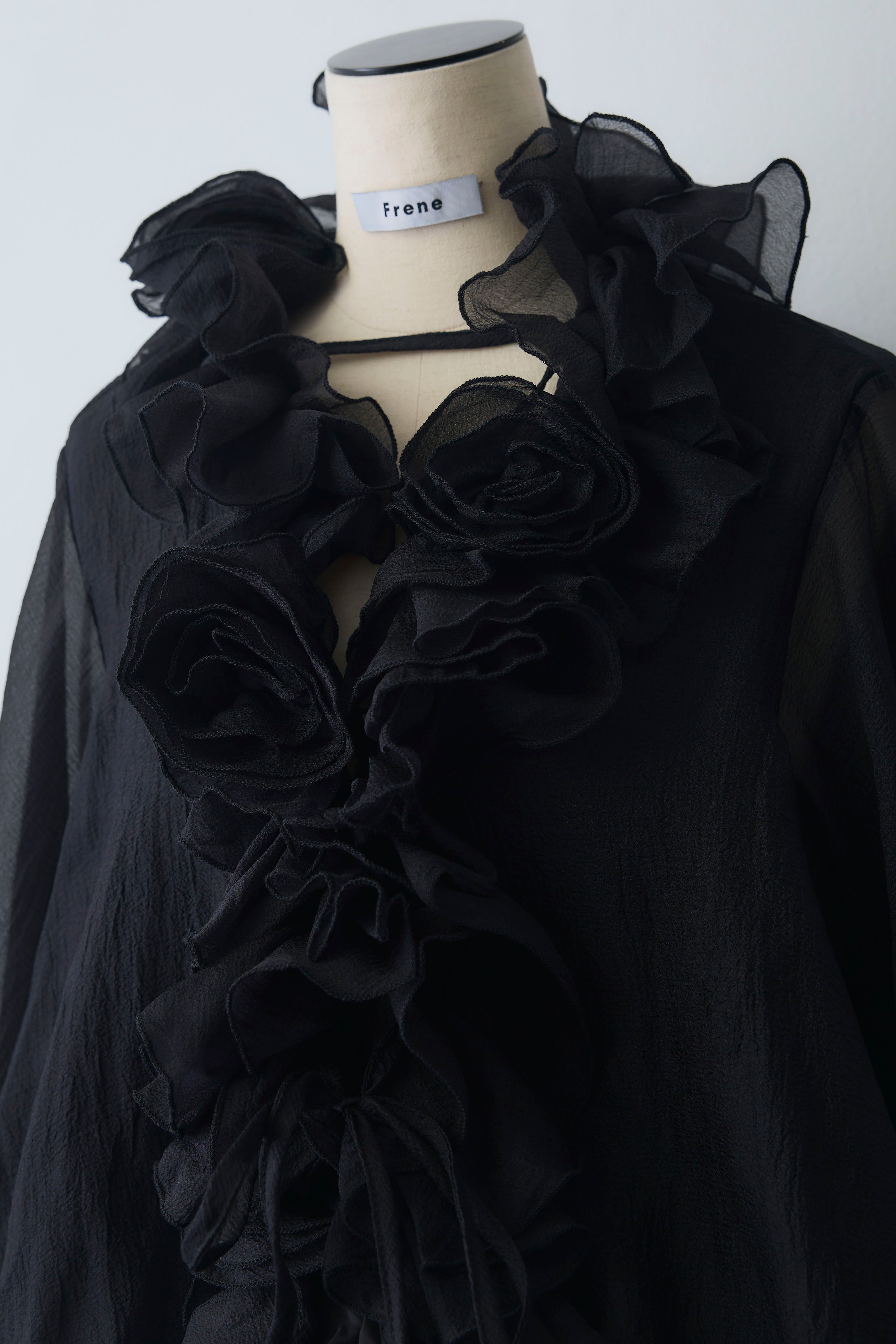 予約]フリルフラワーシフォンエアリーチュニック – Frene