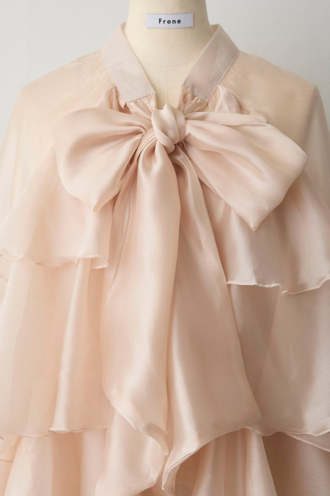 [予約]フロントBIGリボンティアードエアリーチュニック