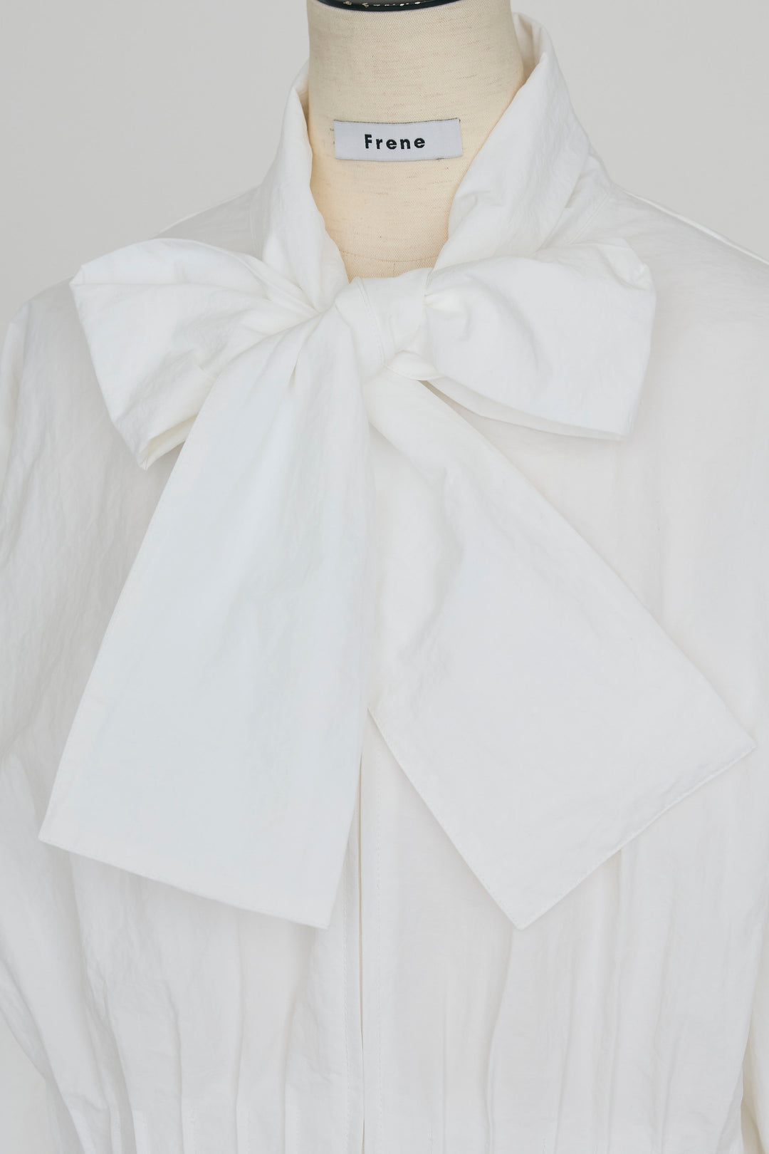 [予約]フロントファスナーヘムタックボウタイブラウス