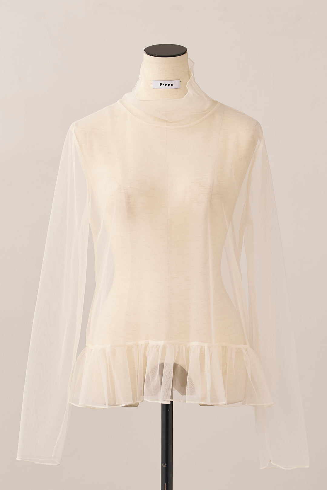 [予約]ハイネックシアーフリルヘムトップス