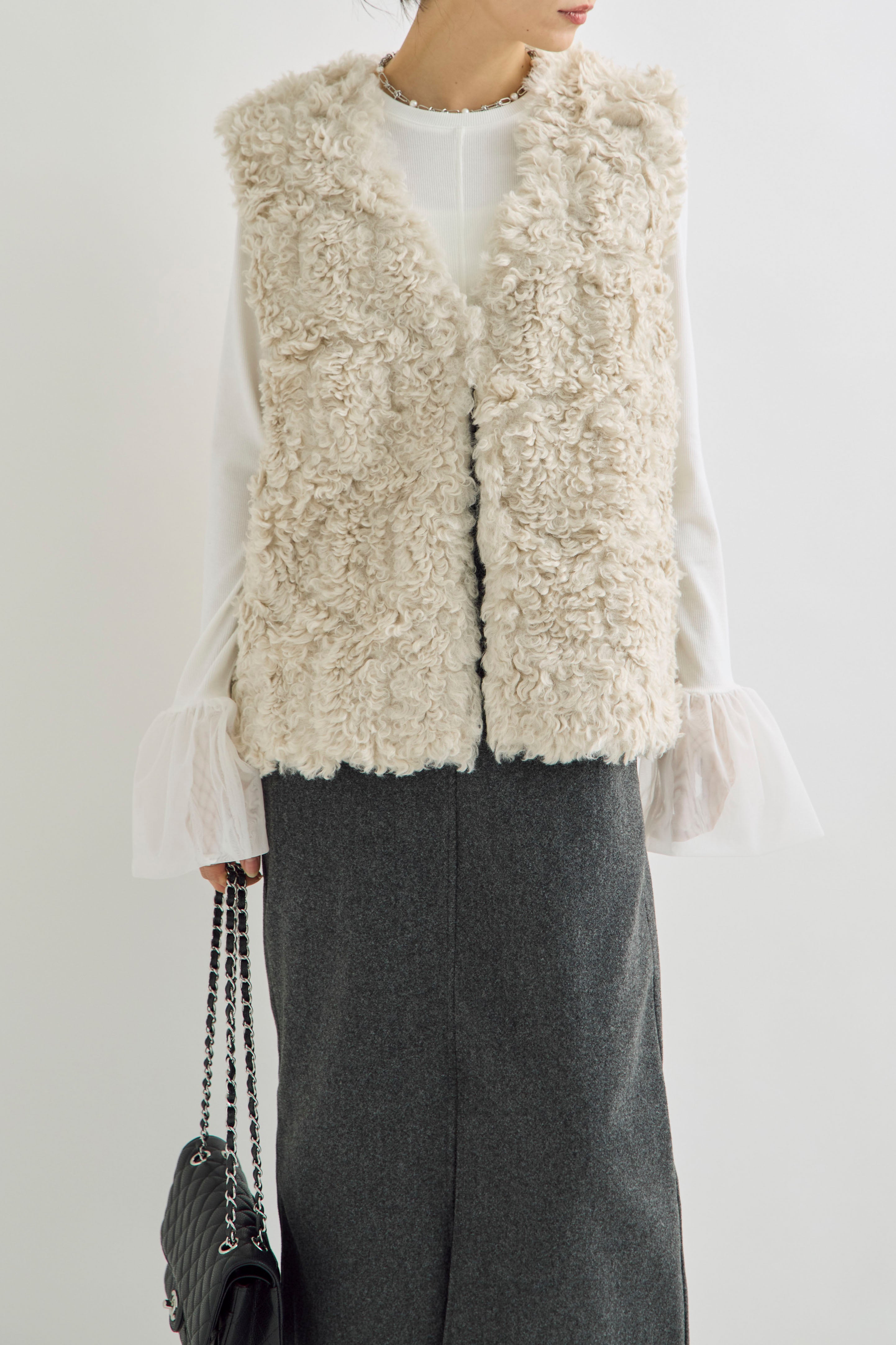 予約]フェイクファータッチノーカラーベスト – Frene