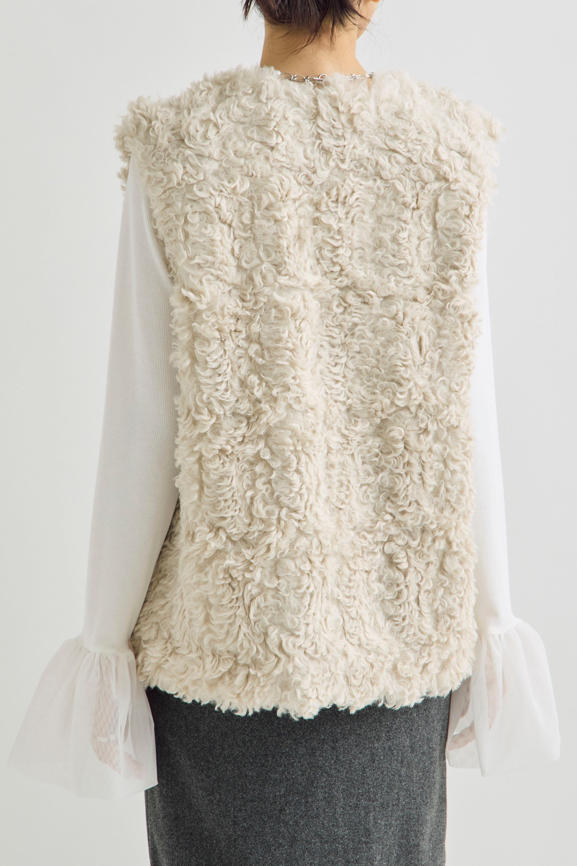 予約]フェイクファータッチノーカラーベスト – Frene