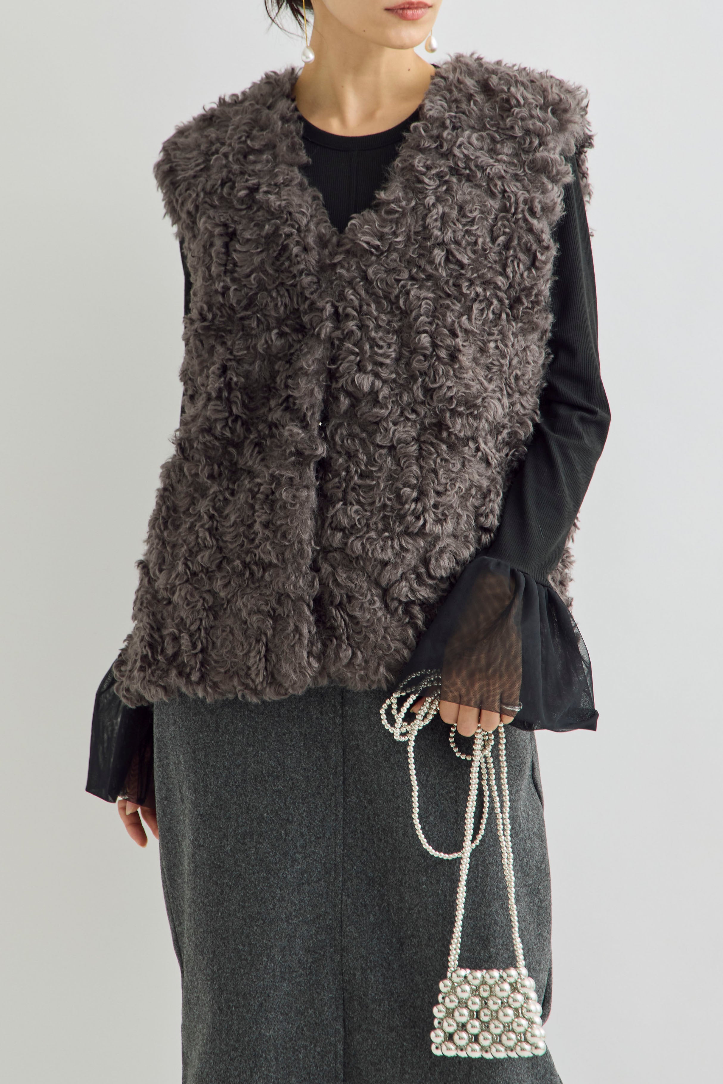 予約]フェイクファータッチノーカラーベスト – Frene